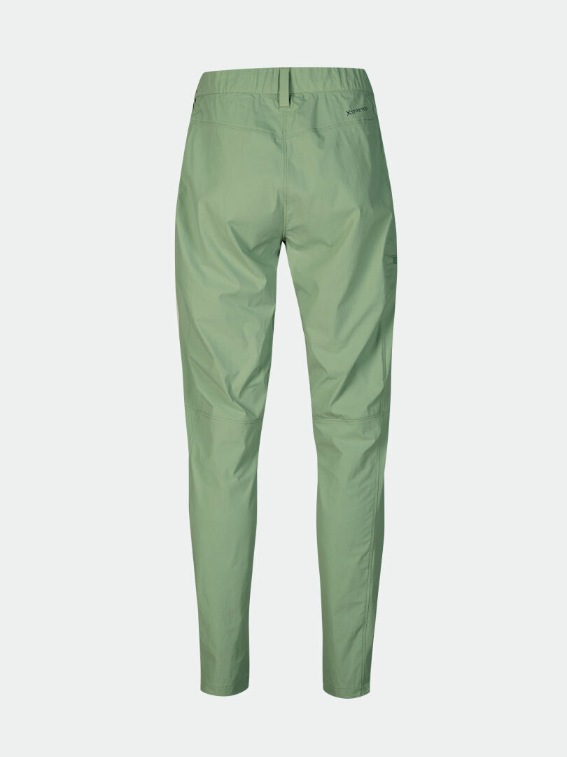 Halti Pallas Cool X-stretch Pants Womens: light green, elastic waist, tapered legs, moisture-wicking fabric.