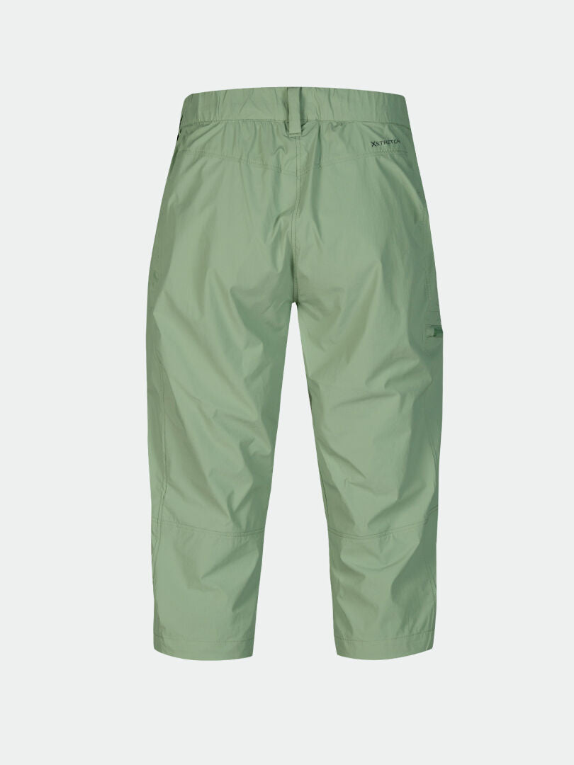 Halti Pallas Cool X-stretch Women’s Plus capri pants in light green, with elastic waistband and visible back seams.