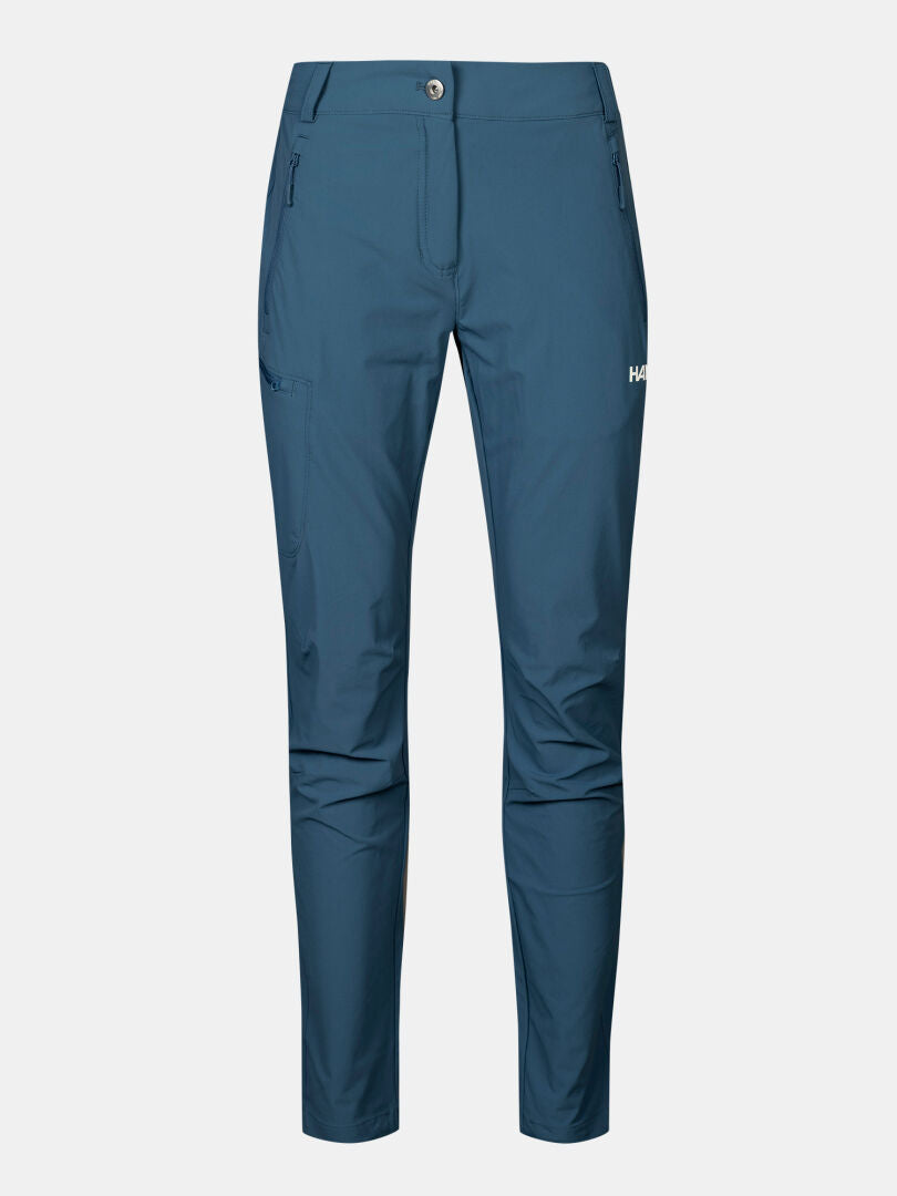 Halti Pallas X-stretch Outdoor Pants Women's in blue, slim-fit with zippered pockets, shown on a white background.