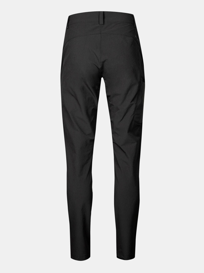 Back view of Halti Pallas X-stretch Outdoor Pants Women's in black, slim fit with seam detail, on a white background.
