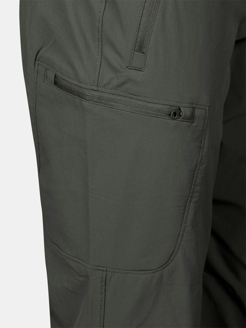 Close-up of zippered pocket on Halti Pallas X-stretch Outdoor Pants Women's Plus, showing stitching and stretch fabric.