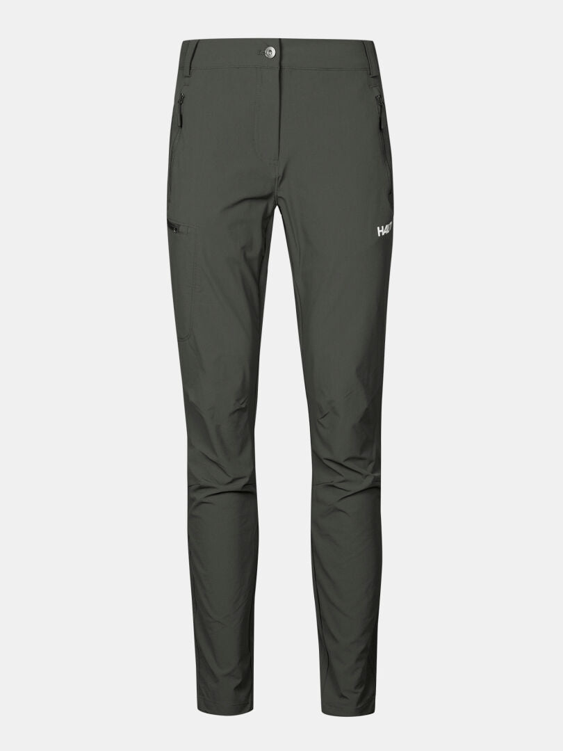 Halti Pallas X-stretch Outdoor Pants Women's Plus in dark green, slim-fit with zip pockets and button waist, shown on white.