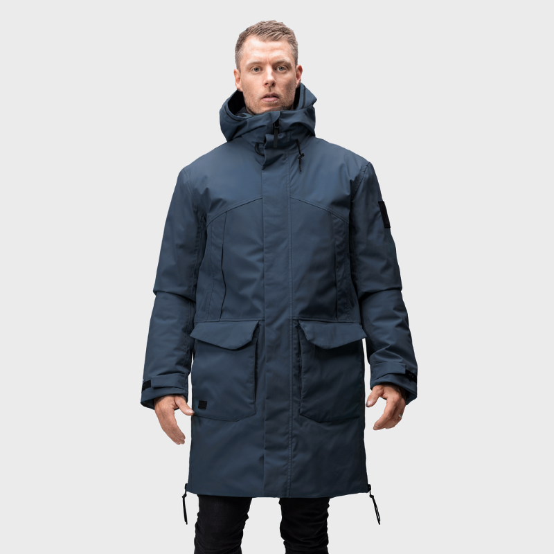 A man in a Halti Bergga Mens DrymaxX Winter Jacket faces forward against a plain light gray background.