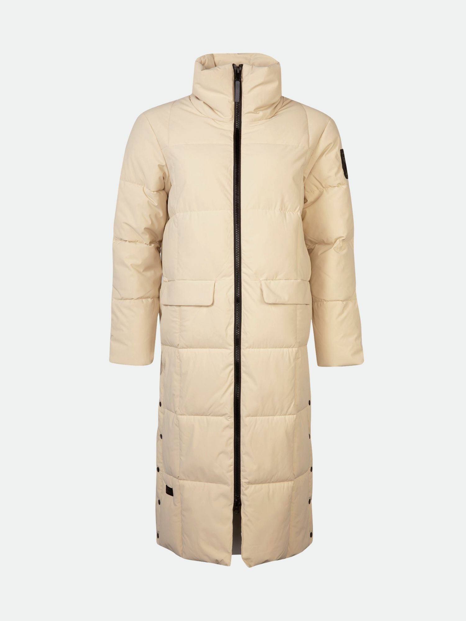 Halti Penger Winter Jacket Women's in beige with high collar, front zipper, flap pockets, and side buttons.