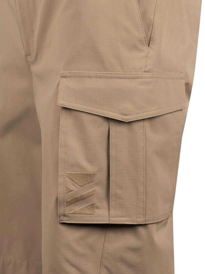 Close-up of Halti Roams Shorts Mens pocket in stretchy ripstop fabric with flap and stitched geometric logo.