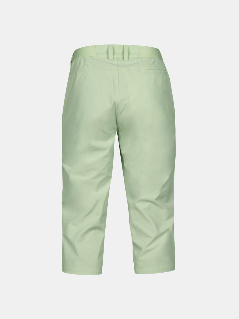 Halti Drive X-stretch Capri Pants Womens in light green, stretch fabric, back view on plain white background.