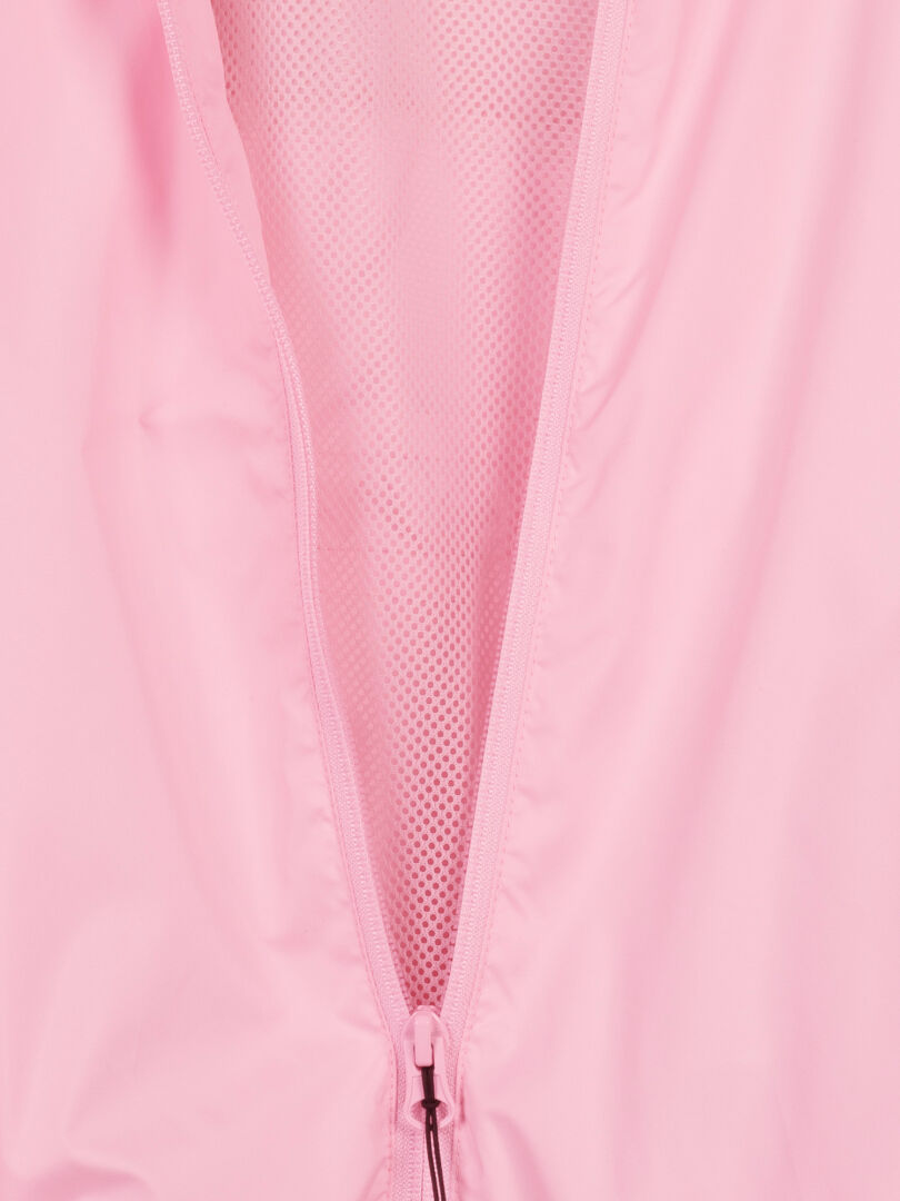 Close-up of Halti's Saime Windbreaker Jacket for women in pink, showing mesh lining and windproof interior.
