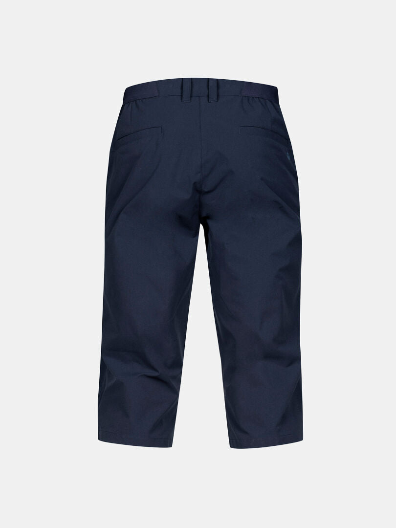 Halti Drive X-stretch Men's capri pants in navy, water-repellent, with belt loops and two back pockets shown.