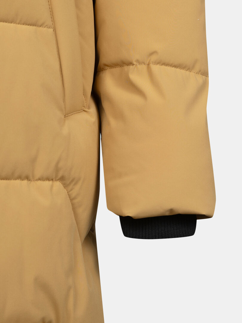 Close-up of Halti Brahe Puffer Long Winter Jacket sleeve in tan recycled polyester with black ribbed cuff.