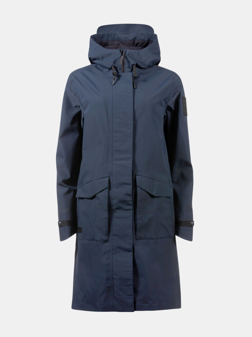 The Halti Tokoi II DX Parka Jacket Womens is a navy, knee-length urban raincoat with hood, zip, flap pockets, and cuffs.