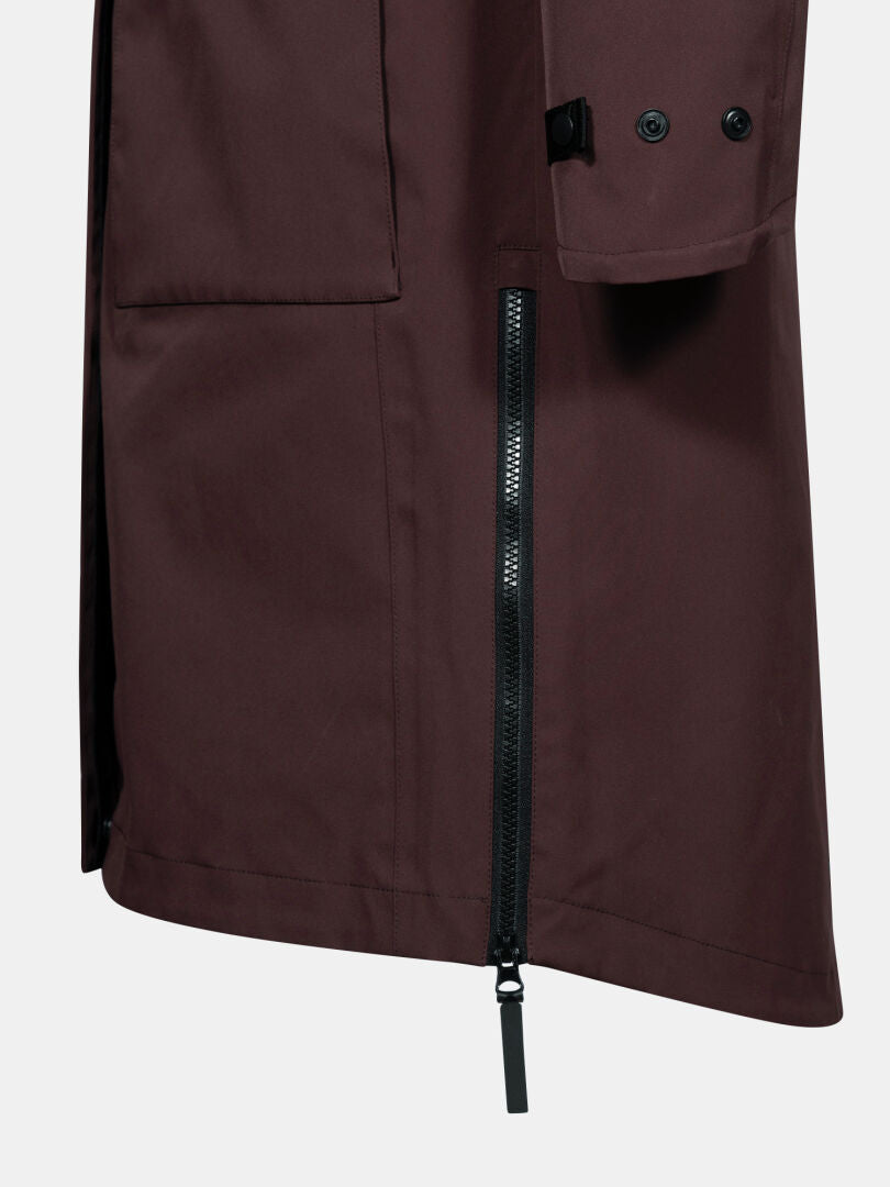 Close-up of the Halti Tokoi II DX Parka Jacket Womens in brown with a black zipper and large front pocket.