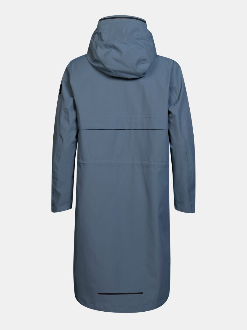 Halti Tokoi II DX Parka Women’s: Long blue raincoat with hood, DrymaxX shell, back vent, straight hem, rear view.