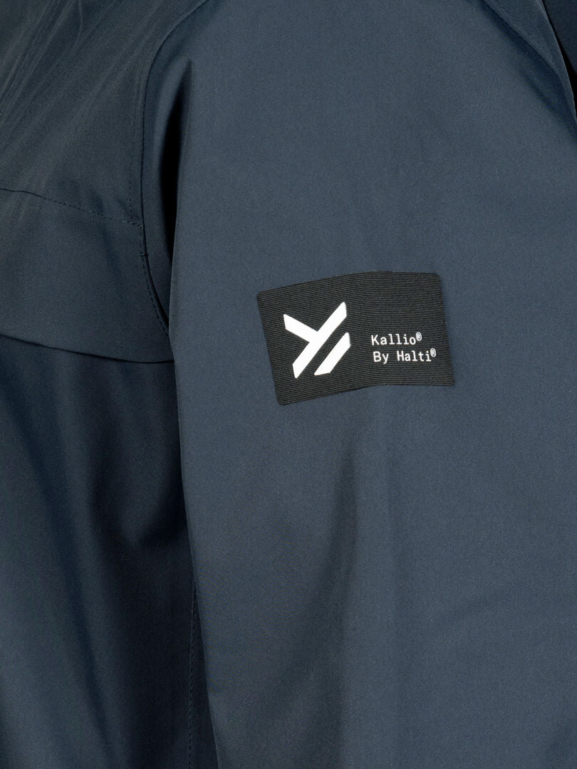 Close-up of Tokoi II DX Parka Jacket Mens sleeve with a Halti patch and white logo in recycled polyester.