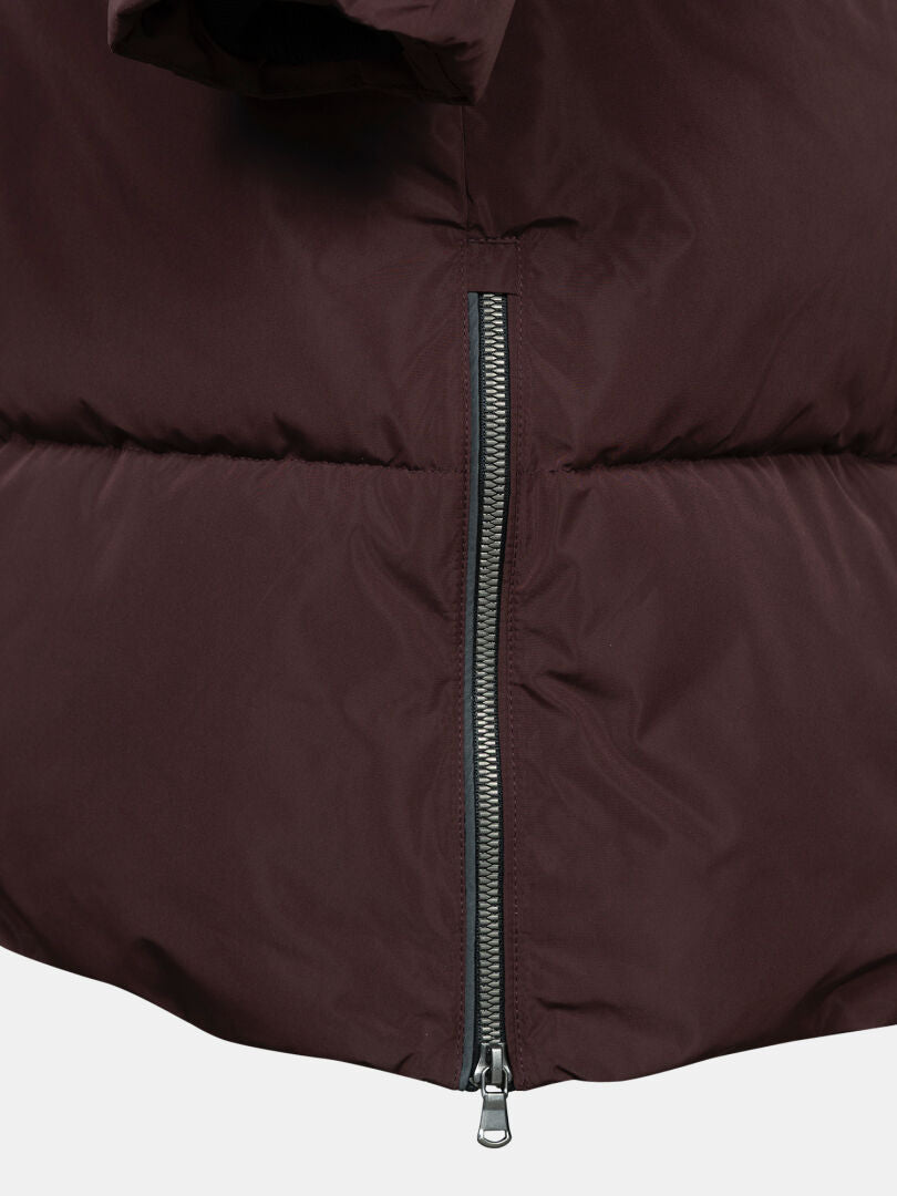 Close-up of Halti Sammal Insulated Parka Jacket Women's in maroon with DrymaxX fabric and a center silver zipper.