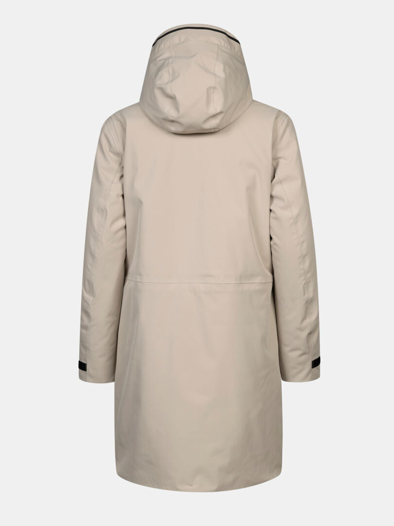 Halti Kallio DX Parka Women’s in beige, long-sleeved with black cuffs—perfect for outdoor performance, shown from back.
