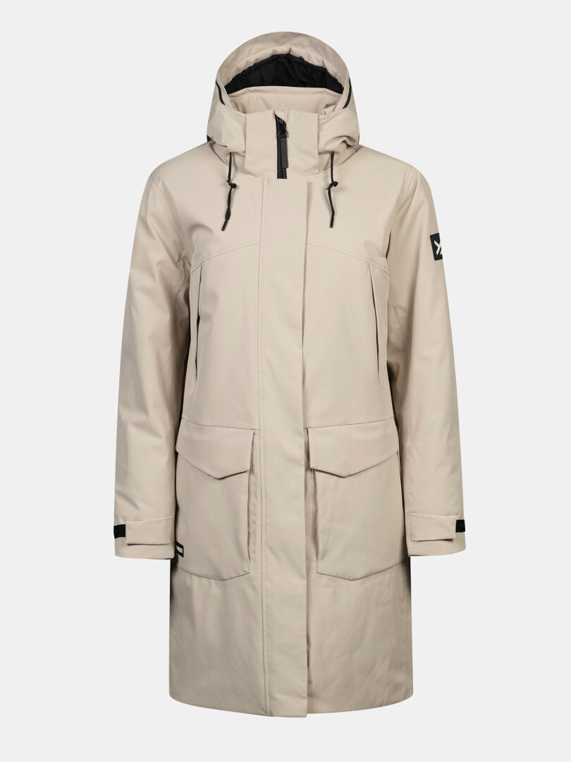 Halti Kallio DX Parka Women’s: beige winter parka with hood, zip front, flap pockets & patch—great for outdoors.