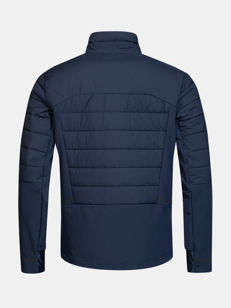 Back view of Halti Valimo Hybrid Insulation Jacket Men’s in navy, quilted design, long sleeves, stand collar, on white.