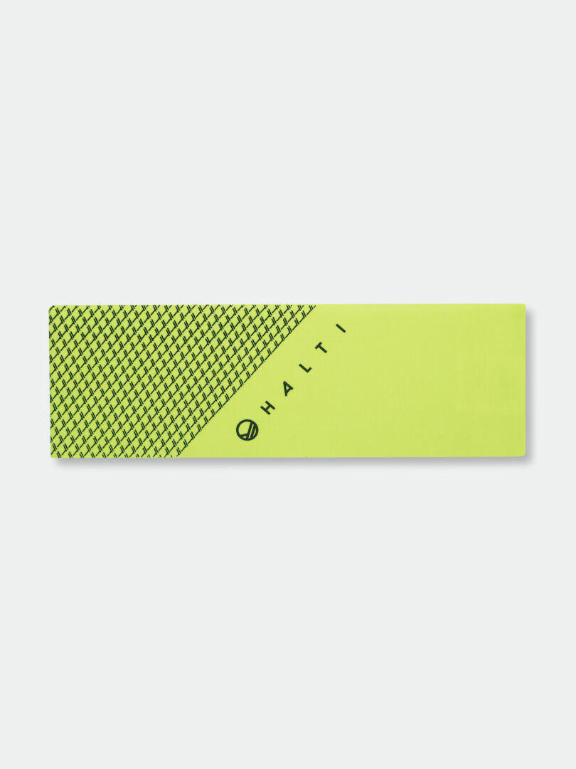 The Halti Suunta Band is a rectangular yellow-green sporty headband with black geometric and reflective prints.