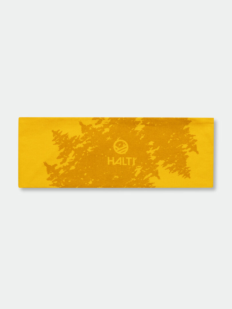 The Halti Laava Band is a sporty yellow headband with a subtle tree branch pattern and logo in the center.