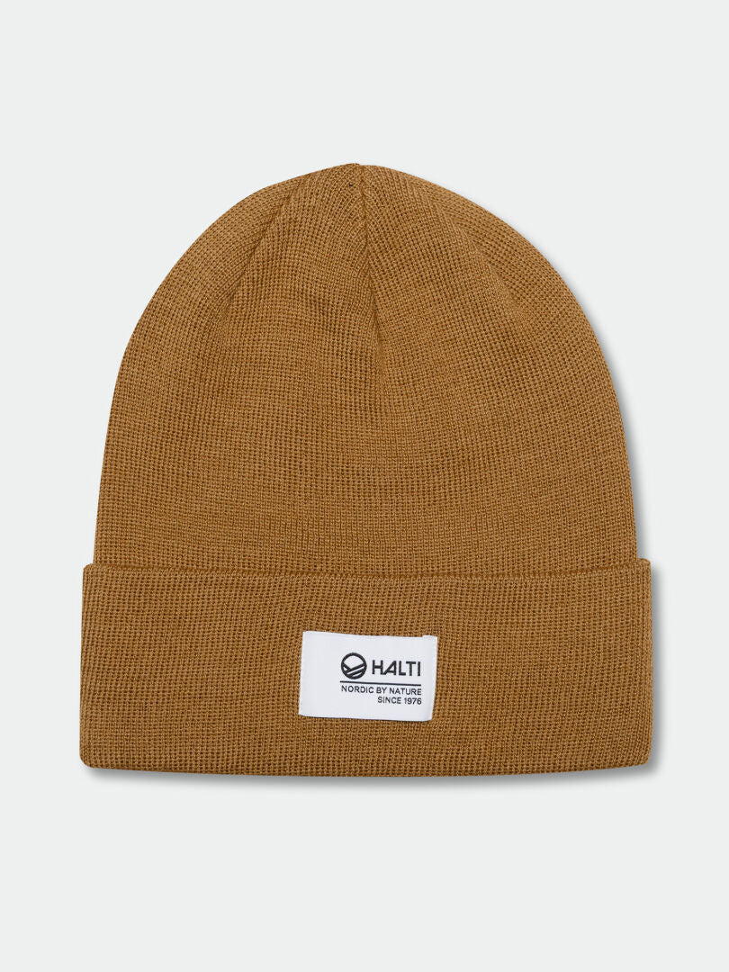 Halti Laus Beanie, brown knit with folded cuff and white logo patch, designed for outdoor activities.