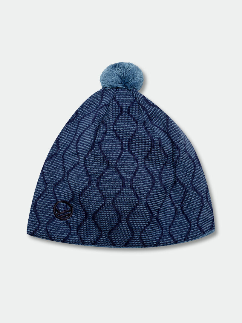 The Halti Mutka Beanie features blue Merino wool, a wave pattern, pom-pom, and logo—perfect for cross-country skiing.