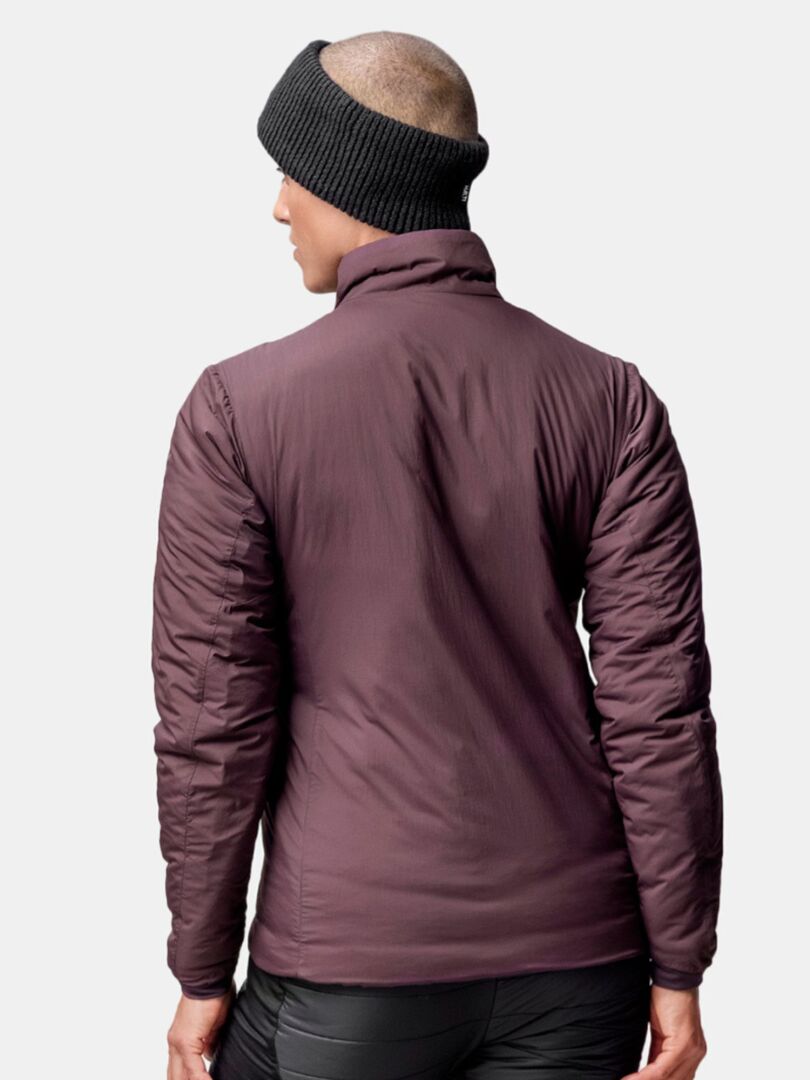 A person wears the Halti Huurre Headband and a plum jacket, shown from the back against a plain background.