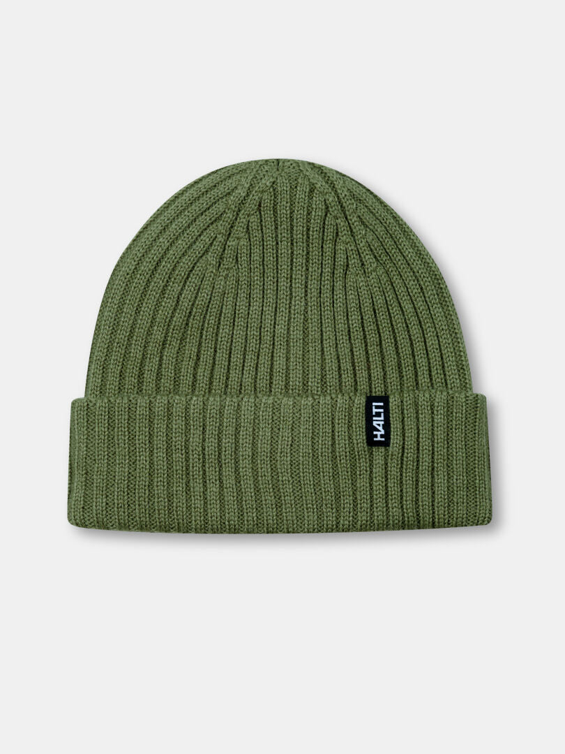 The Runko Beanie by Halti is olive green, rib-knit, with a folded brim and a black Halti tag on the cuff.