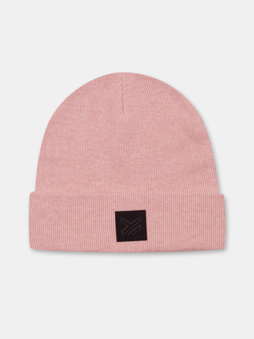 The Halti Vataja Beanie is a pink recycled polyester knit with a folded brim and black patch, shown on white.