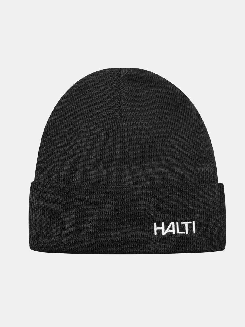Justie Beanie by Halti: black knit winter hat with folded brim and white logo—ideal for outdoor activities.