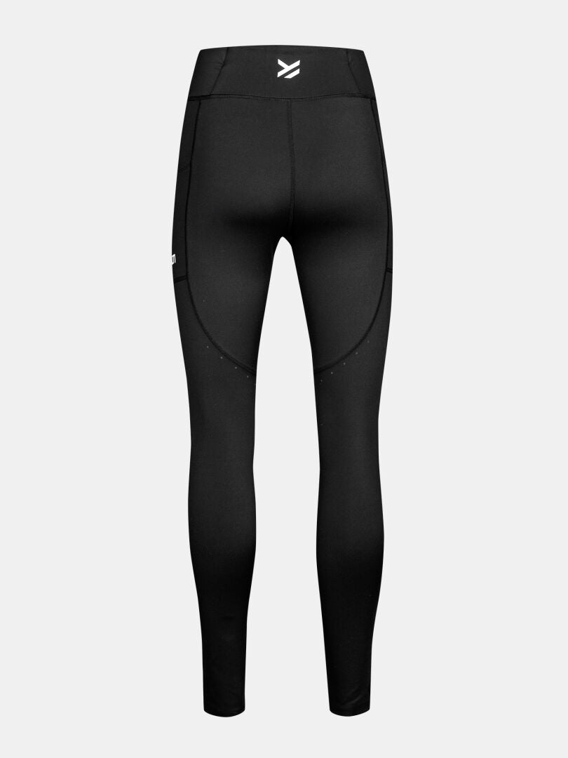 Halti Kaldu Training Tights Women's, black high-waisted with side pockets, shown from the back on light grey.