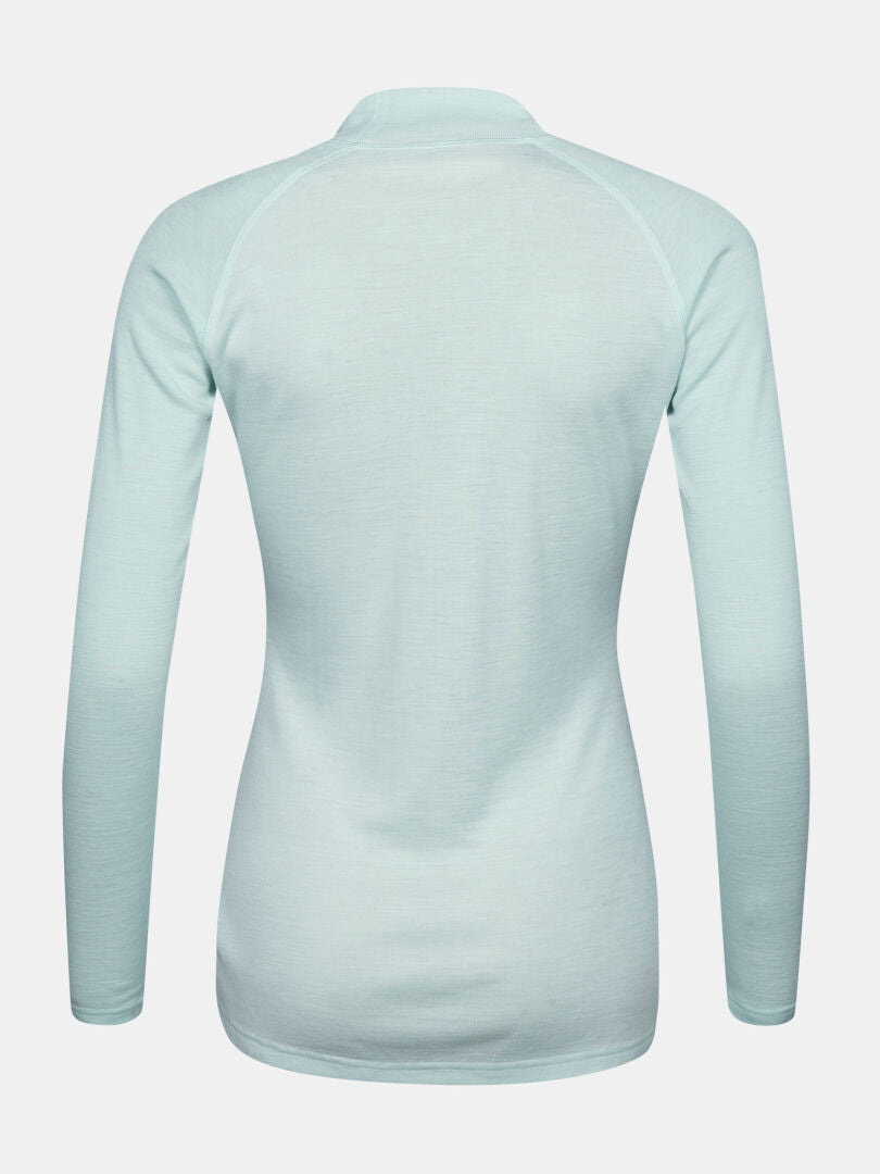 Back view of a light green Neva merino base layer set women’s long-sleeved shirt with a mock neck.