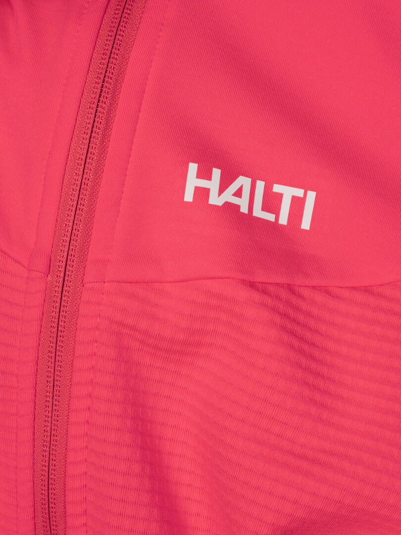Close-up of a pink Halti HeatGrid Layer Jacket Women's with zipper, recycled polyester, and chest logo.