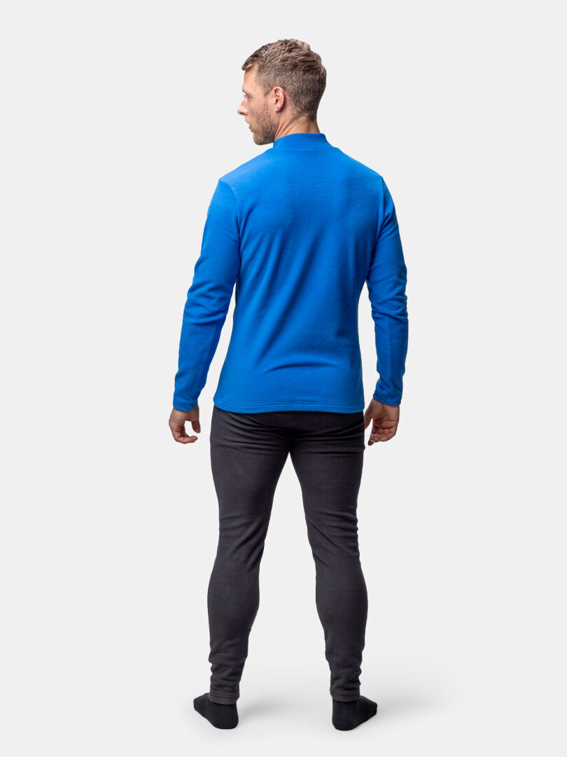 Man facing away wears Halti Trone Fleece Shirt, dark pants, and black socks on a plain white background.