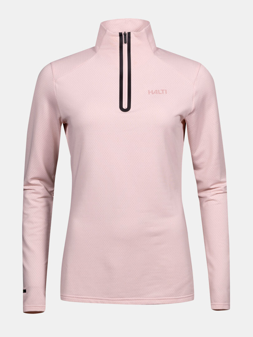The Halti Jaako Shirt Women's is a light pink mid layer with a half-zip front and logo on the left chest.