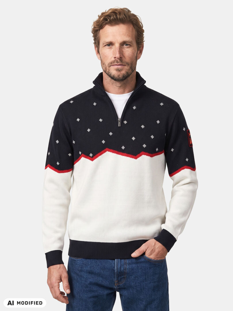 Man in Halti’s Tauko Unisex Sweater with black, white, red details and blue jeans—ideal for everyday wear.