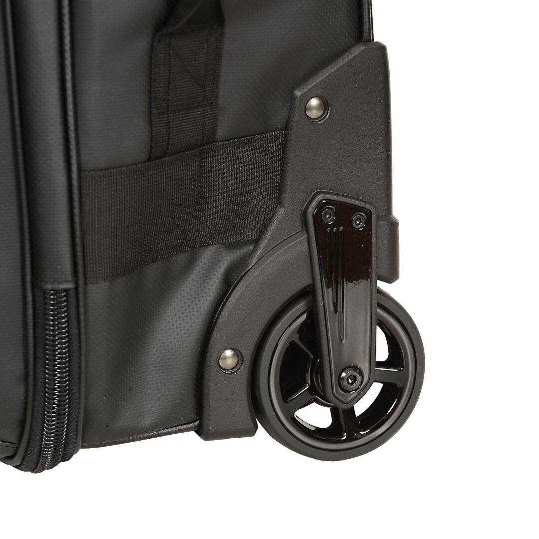 Close-up of Halti Attitude Wheels Bag wheel, showing suitcase body, zipper, and telescopic handle.