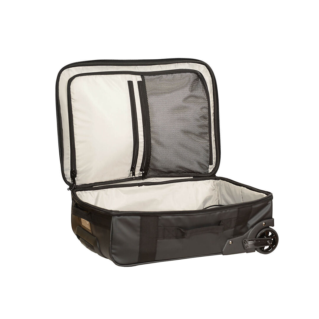 The Halti Attitude Wheels Bag features a telescopic handle, compartments, zip mesh pocket, and cream lining.