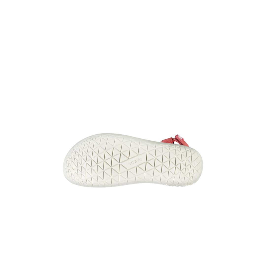 White Phylon sole with geometric pattern, bottom view of Halti Shae Womens Sandal, part of pink strap visible.