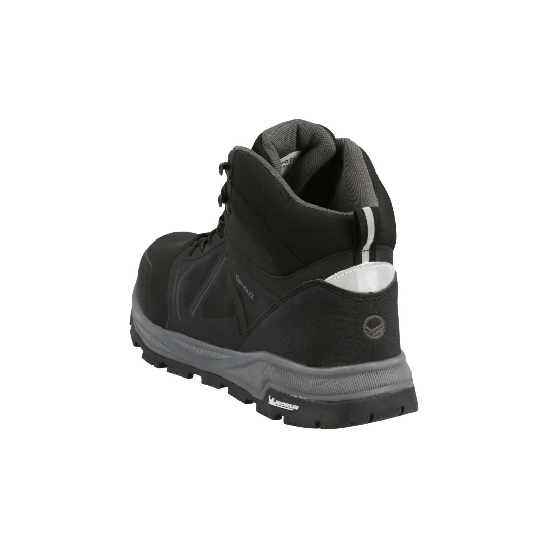 The Halti Jura Mid Outdoor Shoe, black with a thick sole and reflective heel, is shown rear side on a white background.