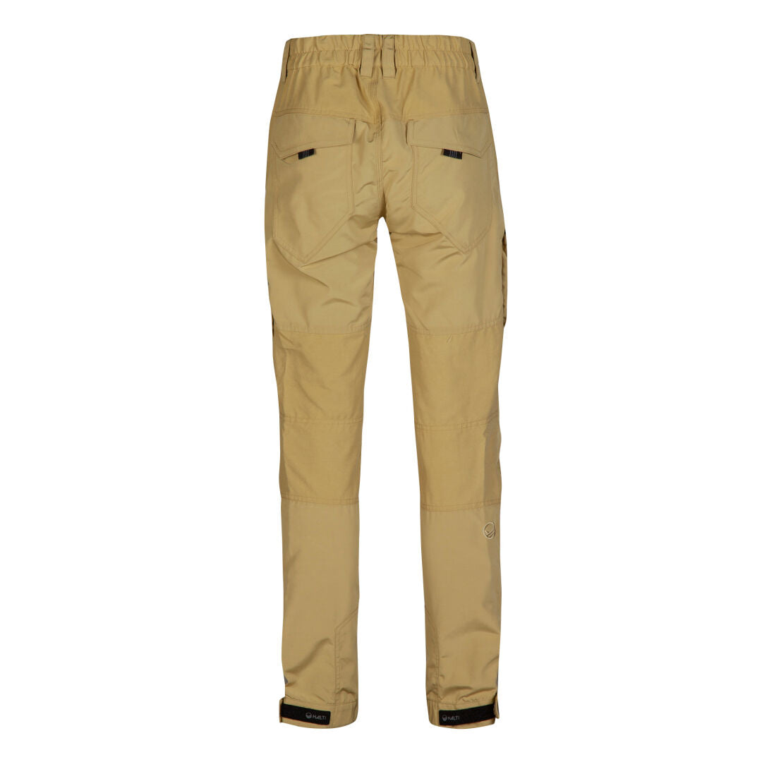 Halti Hiker Womens Ventilated Pants in tan, shown from the back, with back pockets and adjustable ankles.