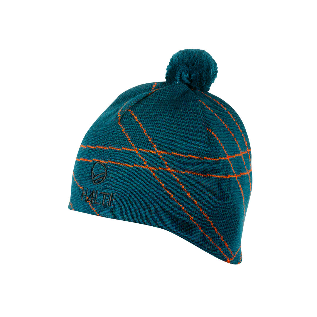 Halti Traviso Beanie: teal wool blend with orange lines, pom-pom, and logo—ideal for winter adventures.