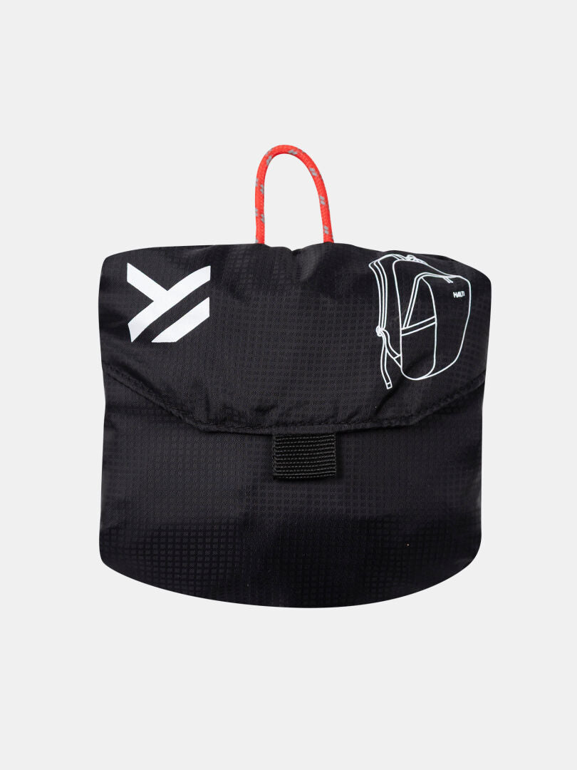 Halti Streetpack Backpack: black, ultralight, packable with red handle and white logo, shown folded on white background.