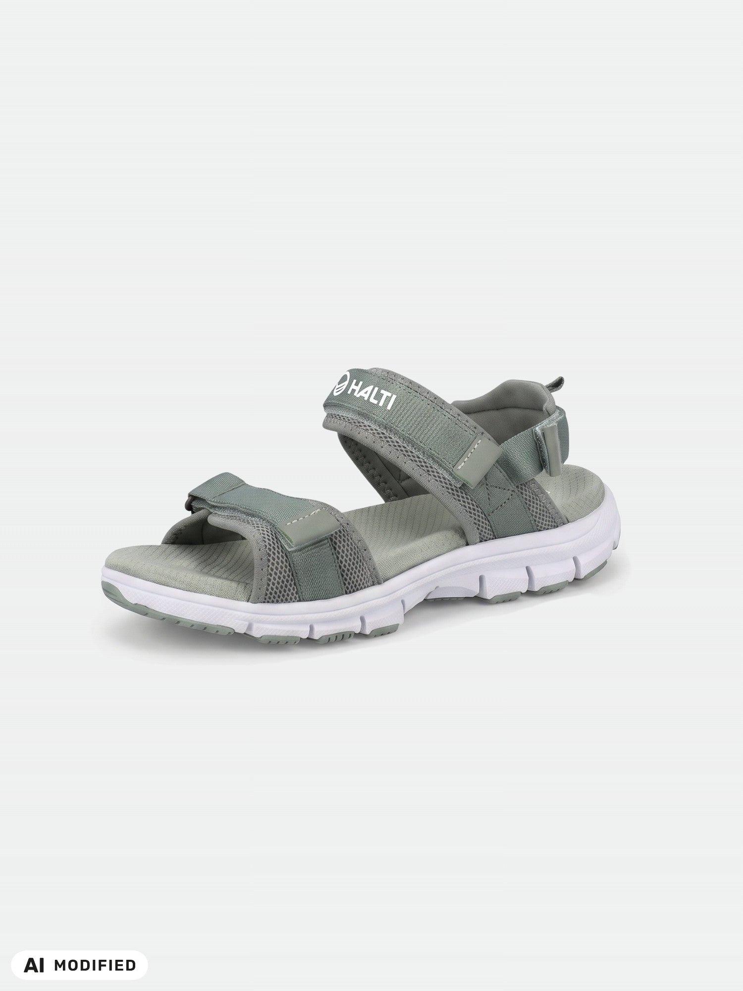 Halti Resa 2 Women's Sandal: gray/white, Velcro strap, thick textured sole, shown on a plain background.