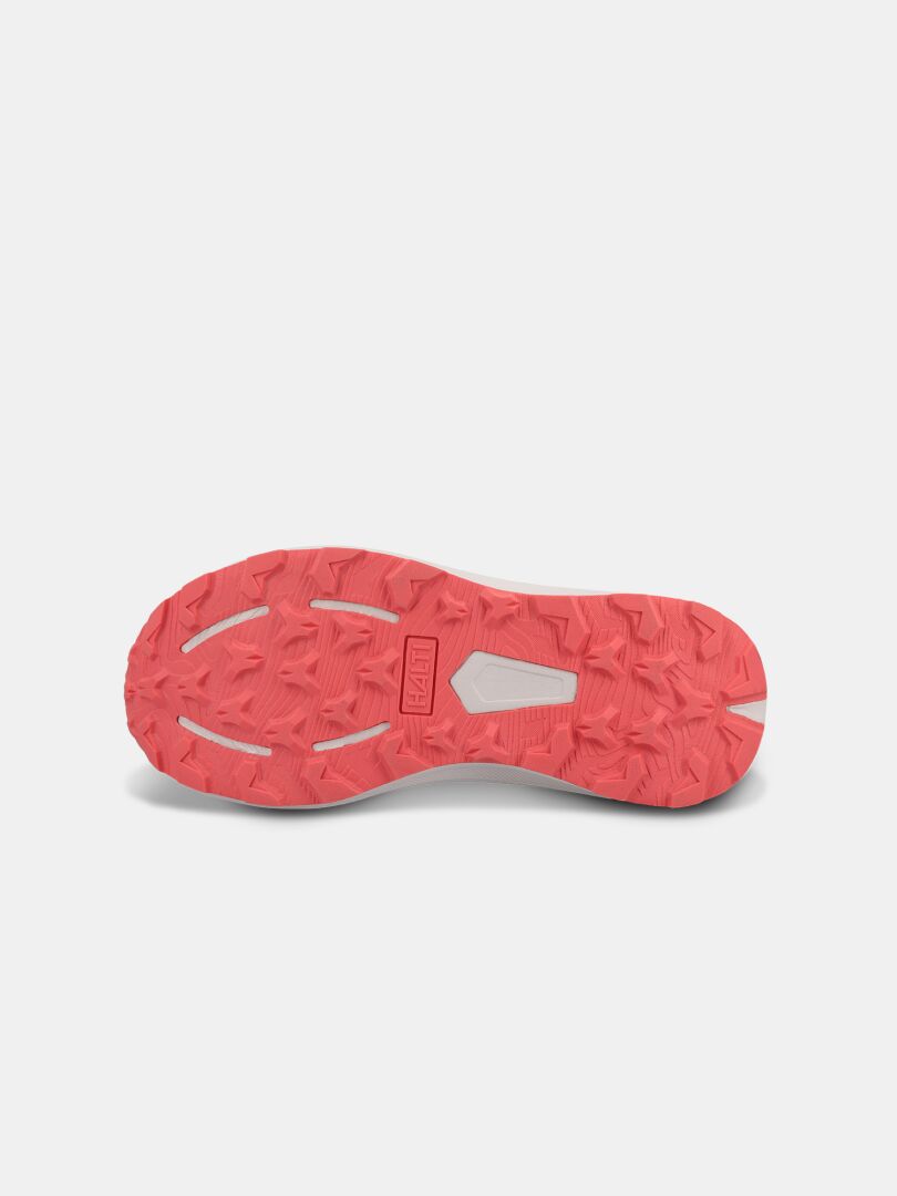 Coral pink outsole of Halti Rapid DX Mid Outdoor Shoe Women's, textured grip, white logo, shown from below on white background.