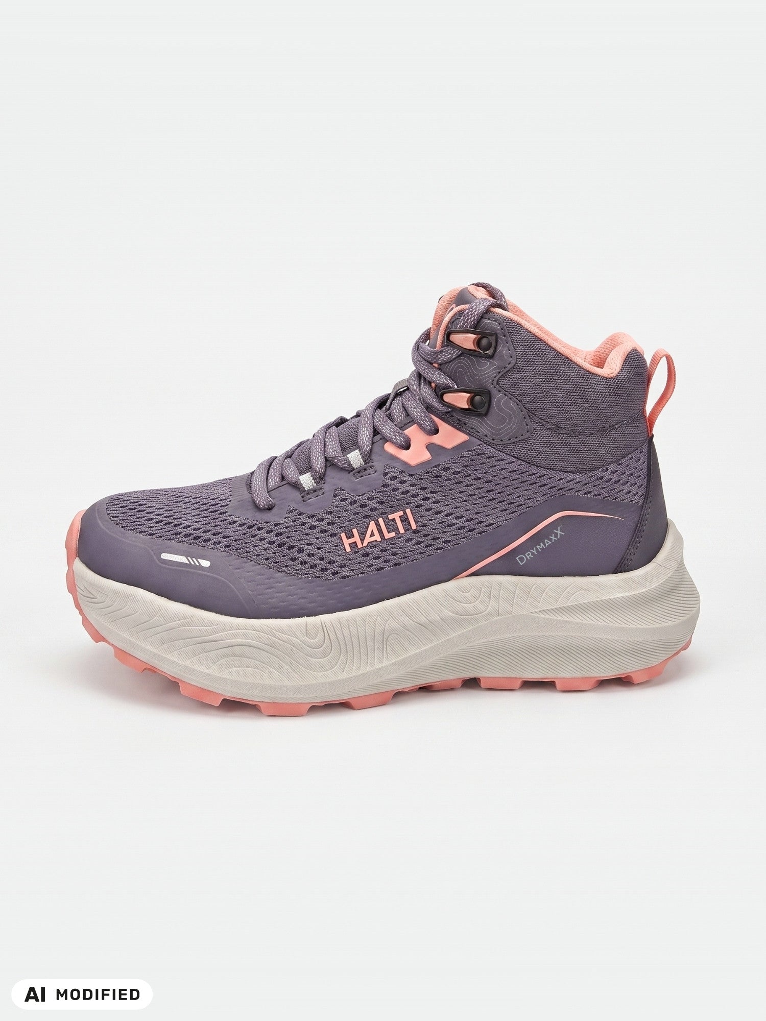 Halti Rapid DX Mid Women’s purple-pink sneaker with thick textured sole, HALTI branding, on white background.