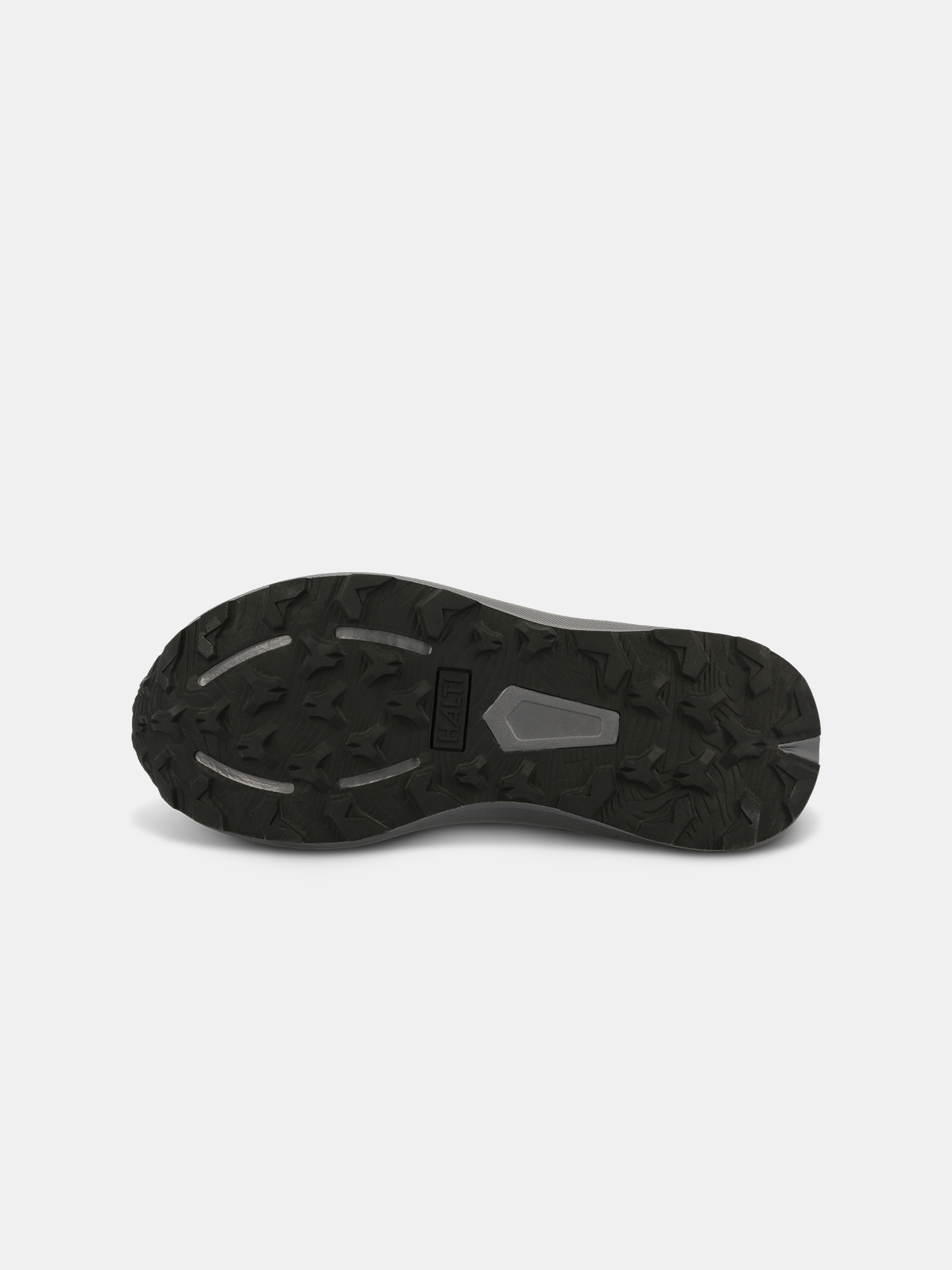 Bottom view of Halti Rapid Mid Freelock DX Shoe Unisex, showing black waterproof sole with rugged tread on white background.
