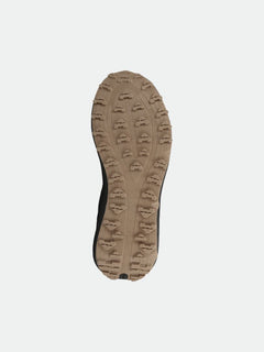 The Halti Morgam DX Mid Womens outdoor shoe features a tan treaded vegan leather sole, shown from below on white.
