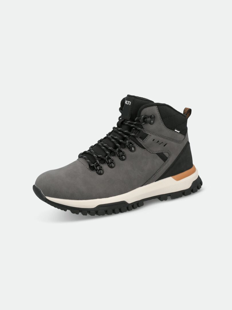 The Halti Korpi DX Mens Outdoor Shoe features gray and black colors, a rugged sole, tan heel, and black laces.