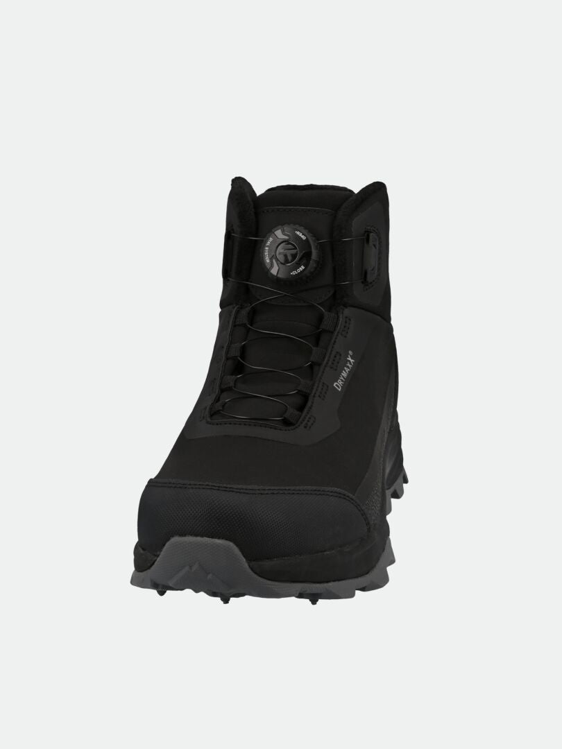 The Halti Yukon Mid 2 DX Freelock Spike Shoe is a black waterproof boot with rugged sole, ideal for hiking any terrain.