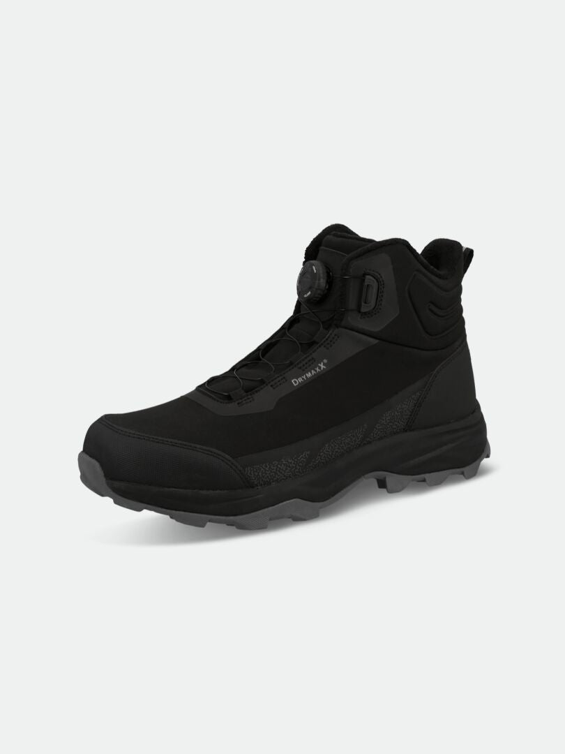 The Halti Yukon Mid 2 DX Freelock Spike Shoe is a black, waterproof high-top with a dial closure and spike outsole.